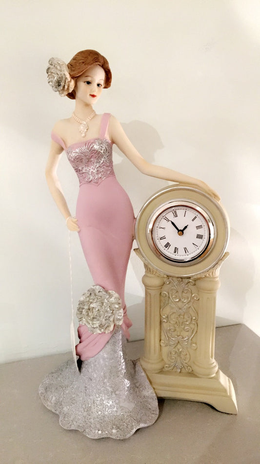 Retro figurine with clock