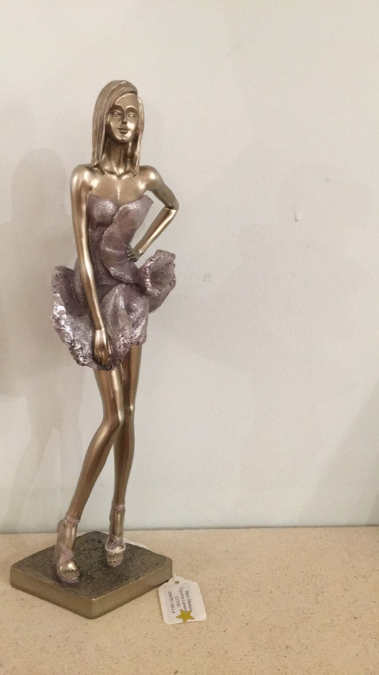 Bronze figurine in party dress